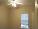 Bedroom featuring a ceiling fan, a window, and closet space at 1204 Grove Park Dr, Charleston, SC 29414