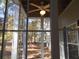 Interior view of screened porch with outdoor views at 1204 Grove Park Dr, Charleston, SC 29414