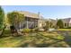 A backyard featuring a screened-in porch, pergola, patio, and professionally designed landscaping at 123 Thousand Oaks Ct, Summerville, SC 29485