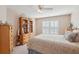 Bedroom with a bed, carpet, natural light from windows with plantation shutters, and wood dresser at 123 Thousand Oaks Ct, Summerville, SC 29485