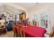 Dining area adjacent to the living room, featuring French doors leading to the outdoors at 123 Thousand Oaks Ct, Summerville, SC 29485