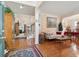 Welcoming home foyer, featuring hardwood floors, an open staircase, and sophisticated decor enhancing its charm at 123 Thousand Oaks Ct, Summerville, SC 29485
