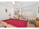 Bright game room features a ceiling fan, pool table, and staircase leading to the upper level at 123 Thousand Oaks Ct, Summerville, SC 29485