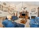 Spacious living room with high ceilings, fireplace, and stairway to the second floor at 123 Thousand Oaks Ct, Summerville, SC 29485