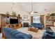 Inviting living room featuring vaulted ceilings, a fireplace, and comfortable seating arrangements at 123 Thousand Oaks Ct, Summerville, SC 29485