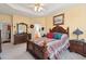 Main bedroom with a large bed, furniture, and view to the bathroom at 123 Thousand Oaks Ct, Summerville, SC 29485