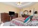 Spacious main bedroom featuring a large bed and wood furniture sets at 123 Thousand Oaks Ct, Summerville, SC 29485