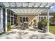 This patio features a white pergola, seating, and a grill at 123 Thousand Oaks Ct, Summerville, SC 29485
