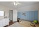 bedroom with blue accent wall, hardwood floors, dresser, wood bed frame, and closet at 1249 Shadow Mist Ln, Charleston, SC 29492