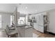 Kitchen featuring white cabinets, gray countertop, stainless appliances and eating bar at 1249 Shadow Mist Ln, Charleston, SC 29492