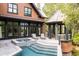 Stunning backyard with inground pool, hot tub, outdoor dining area, and gazebo at 127 Blue Heron Pond Rd # A, Kiawah Island, SC 29455