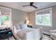 Serene bedroom with neutral tones, plush bedding, and views of the surrounding landscape at 127 Blue Heron Pond Rd # A, Kiawah Island, SC 29455