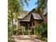 Stately home featuring an inviting driveway and lush landscaping at 127 Blue Heron Pond Rd # A, Kiawah Island, SC 29455