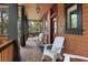 Charming front porch with rocking chairs, creating a welcoming outdoor space at 127 Blue Heron Pond Rd # A, Kiawah Island, SC 29455