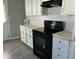 Well-equipped kitchen with modern range and white cabinets for ample storage space at 139 Stephanie Cir, Summerville, SC 29483