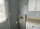 Practical laundry room featuring overhead cabinets and convenient utility hookups at 139 Stephanie Cir, Summerville, SC 29483