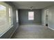 Bright living room with plush carpeting, neutral walls, and ample natural light at 139 Stephanie Cir, Summerville, SC 29483