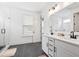 Bright bathroom with dual sinks, framed mirror, and walk-in glass shower at 1420 Homecoming Blvd, Ravenel, SC 29470