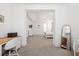 Bright bedroom flows to the Primary suite at 1420 Homecoming Blvd, Ravenel, SC 29470