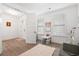 Well-lit bonus room or playroom features hardwood floors and bright white walls at 1420 Homecoming Blvd, Ravenel, SC 29470