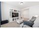 Comfortable living room featuring built in shelving, and carpet at 1420 Homecoming Blvd, Ravenel, SC 29470