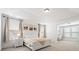 Spacious main bedroom with sitting area, bright light, and carpet floors at 1420 Homecoming Blvd, Ravenel, SC 29470