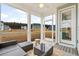 Screened patio offers outdoor living with views of a beautiful community at 1420 Homecoming Blvd, Ravenel, SC 29470