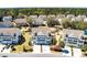An aerial view showcasing the property's location and landscaping including mature palm trees at 1457 Red Tide Rd, Mount Pleasant, SC 29466