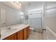 Bathroom featuring a single vanity, toilet and tub/shower with modern tile at 1457 Red Tide Rd, Mount Pleasant, SC 29466