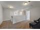 Cozy loft area features neutral carpet, fresh white walls and contemporary seating, perfect for relaxation at 1457 Red Tide Rd, Mount Pleasant, SC 29466