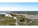 Expansive aerial view of marshlands with a boardwalk leading to a gazebo and picturesque scenery at 1457 Red Tide Rd, Mount Pleasant, SC 29466