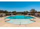 Resort-style community pool with cabanas, lounge chairs, and mature palm trees at 1457 Red Tide Rd, Mount Pleasant, SC 29466