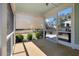 Relaxing screened porch with view of backyard and retractable sun shade for optimal comfort at 1457 Red Tide Rd, Mount Pleasant, SC 29466