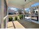 Screened porch with a view of the backyard and surrounding neighborhood at 1457 Red Tide Rd, Mount Pleasant, SC 29466