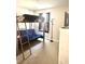 Unique bedroom design featuring a lofted bed above a cozy futon seating area and a wardrobe at 148 Saint Charles Way, Goose Creek, SC 29445