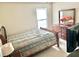 Inviting bedroom with natural light, a comfortable bed, and a wooden dresser, perfect for a relaxing retreat at 148 Saint Charles Way, Goose Creek, SC 29445