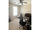 Bright home office with neutral paint, carpet, ceiling fan, and a window that allows in natural light at 148 Saint Charles Way, Goose Creek, SC 29445