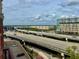 Urban living with a view of city buildings and roads on a partly cloudy day at 150 Bee St # 713, Charleston, SC 29401