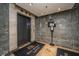 Elegant elevator lobby showcasing modern design with stone accents and stylish flooring at 150 Bee St # 713, Charleston, SC 29401