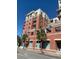 A brick building with many stories and balconies under a bright blue sky at 150 Bee St # 713, Charleston, SC 29401