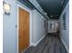 Well-lit hallway with contemporary design, leading to stylishly appointed residential units at 150 Bee St # 713, Charleston, SC 29401