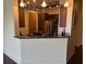 Kitchen featuring a breakfast bar with granite countertops and decorative lighting at 150 Bee St # 713, Charleston, SC 29401