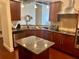 A well-equipped kitchen with stainless steel appliances and granite countertops at 150 Bee St # 713, Charleston, SC 29401
