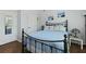 Bedroom featuring a metal bed frame, neutral walls, and a closet, creating a cozy and functional living space at 1522 Telfair Way, Charleston, SC 29412