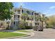 Inviting multi-story condo building with charming balconies and beautiful palm trees at 1522 Telfair Way, Charleston, SC 29412