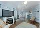 Spacious living area featuring a ceiling fan, wood floors, and comfortable furnishings at 1522 Telfair Way, Charleston, SC 29412