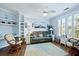 Inviting living room with wood flooring, plantation shutters and coastal decor at 1522 Telfair Way, Charleston, SC 29412