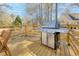 The back deck's stainless steel BBQ grill and outdoor seating offers a great space for outdoor meals at 1704 Tolbert Way, Mount Pleasant, SC 29466