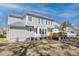 Sprawling backyard with deck and covered patio provides the perfect space for outdoor living and entertainment at 1704 Tolbert Way, Mount Pleasant, SC 29466