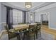 Stylish dining room with hardwood floors, modern lighting, and convenient access to other rooms at 1704 Tolbert Way, Mount Pleasant, SC 29466